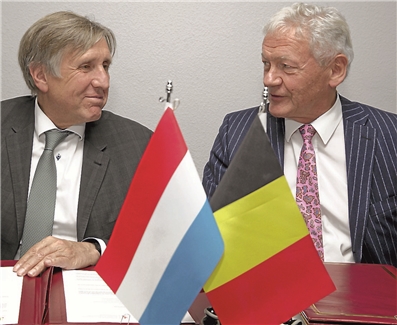 Le Luxembourg verse 30 millions d'euros par an à la Belgique, en plus des accords sur les transports (ici François Bausch et le Belge François Bellot).
