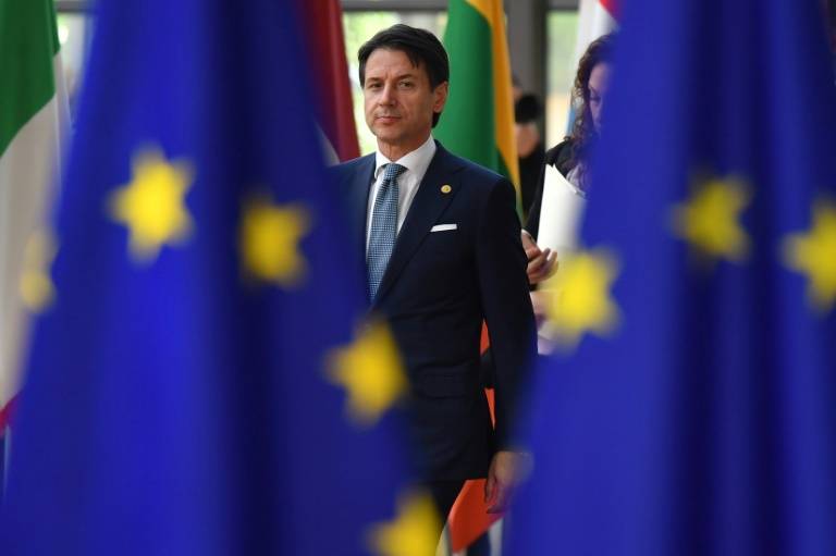 L'Italie, dirigée par Giuseppe Conte, constitue un risque réel pour la zone euro, à cause de sa dette, de ses banques fragiles et de son gouvernement populiste, insistent les économistes ( AFP/Archives / Ben STANSALL ) L'Italie, dirigée par Giuseppe Conte, constitue un risque réel pour la zone euro, à cause de sa dette, de ses banques fragiles et de son gouvernement populiste, insistent les économistes.